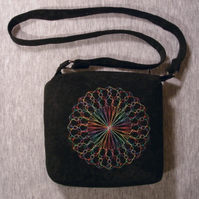 outline swirl purse
