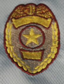 badge front