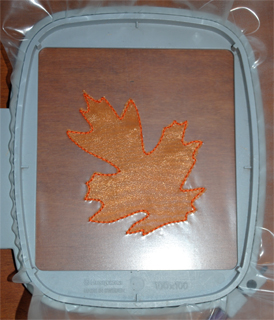 Organza machine embroidered leaves